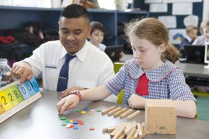 St Pius Catholic Primary School Enmore - teacher and student at learning Facility